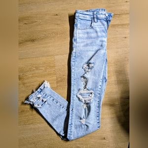American Eagle super highrise super distressed jegging